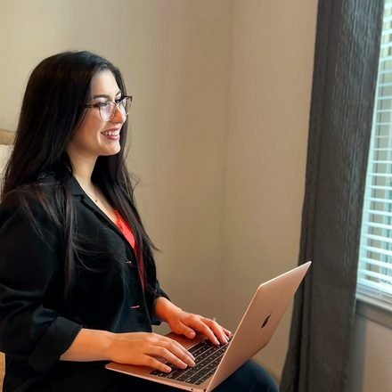 Vanessa Ribeiro working from home.